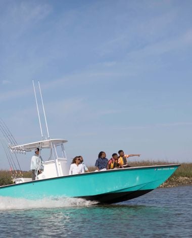 family on fishing boat