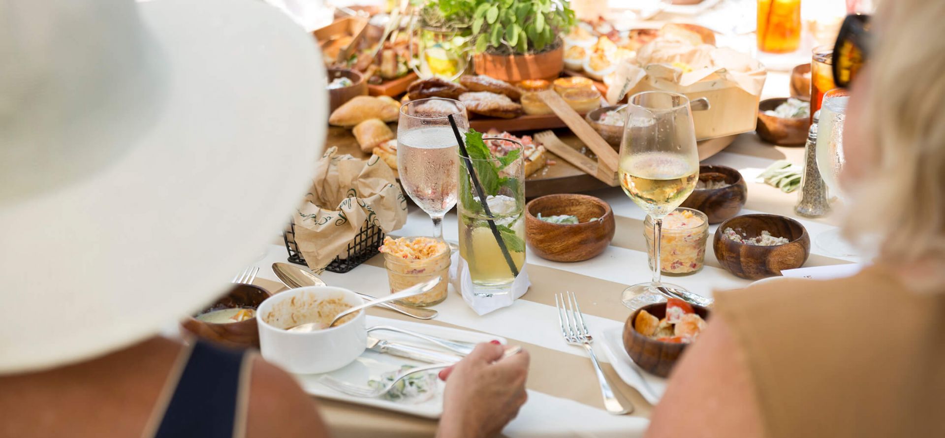 a group of people eating while meeting