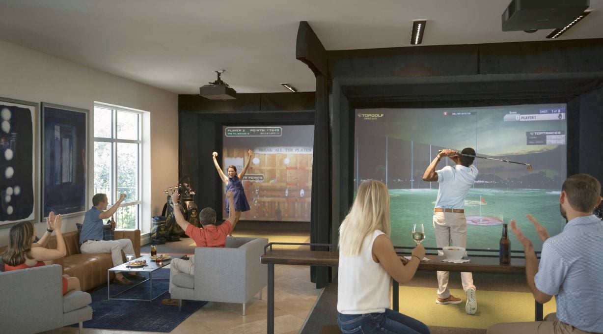 Guests playing games at Top Golf