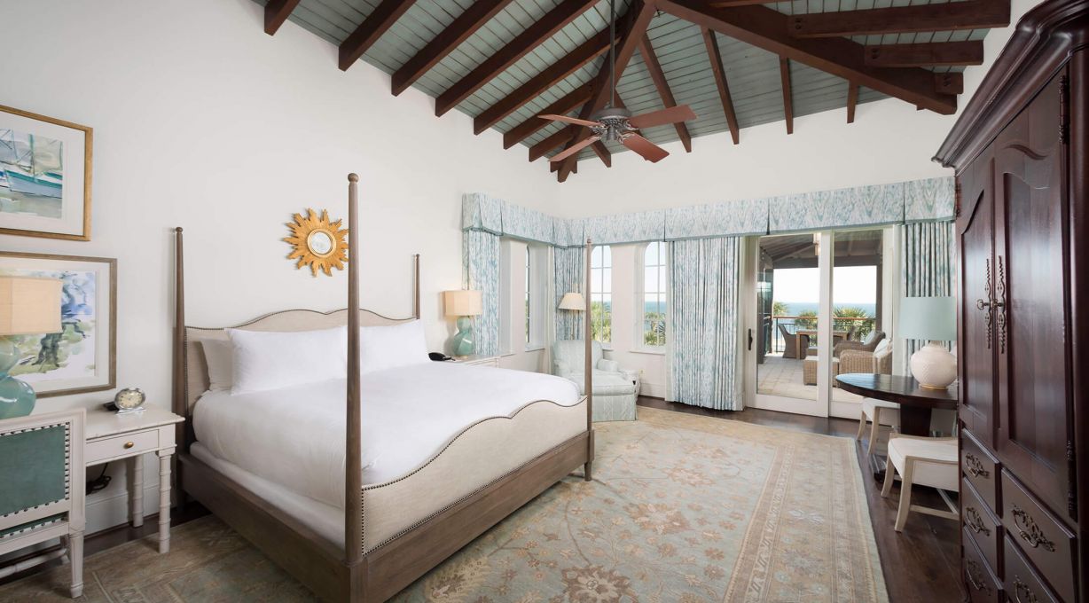 Beach Club bedroom with sitting area and small table