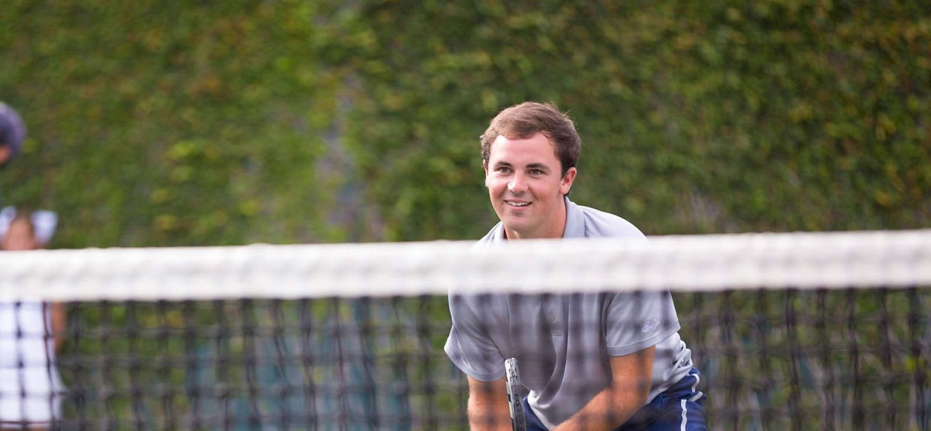 A guy playing tennis