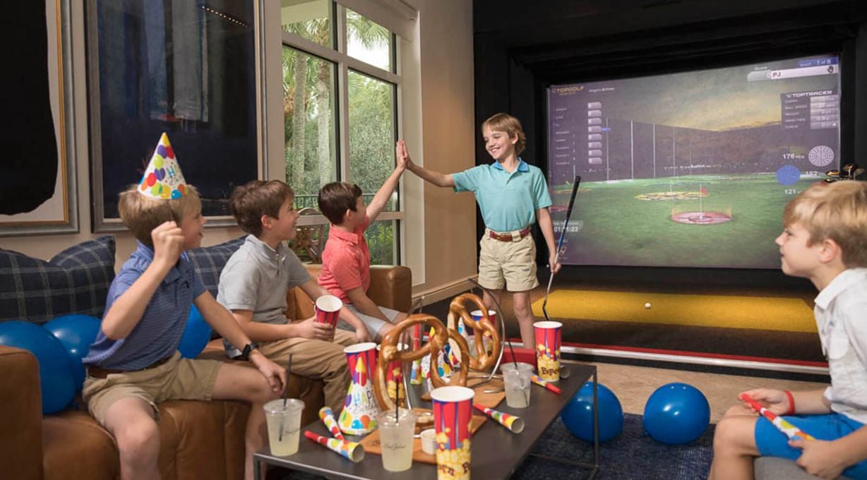 Children gathered for a birthday party at Top Golf