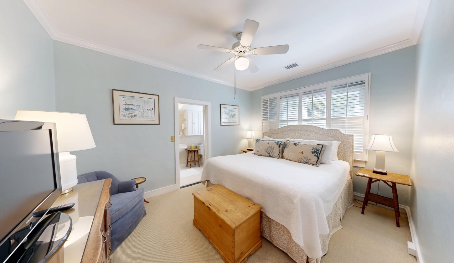 A large bedroom with an ensuite