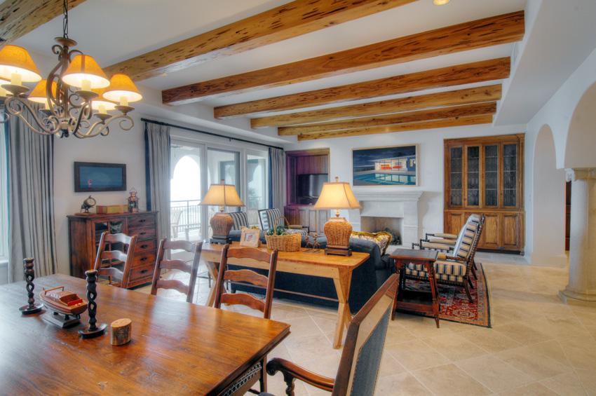 Living room with exposed wood ceiling
