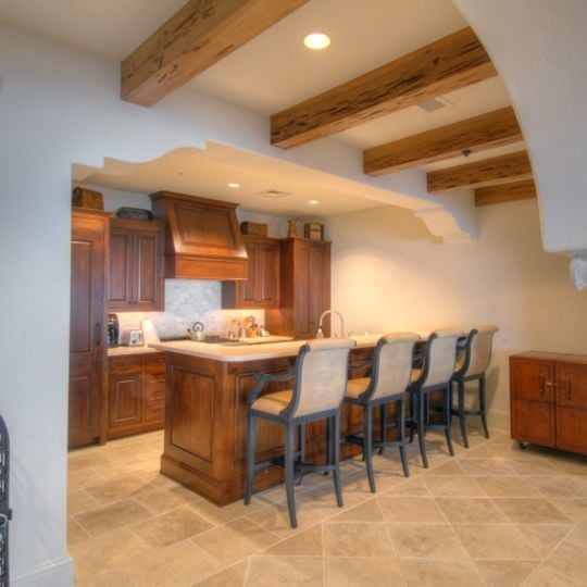 Kitchen with wood cabinets and light countertops