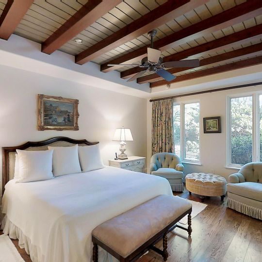 bedroom with light green chairs
