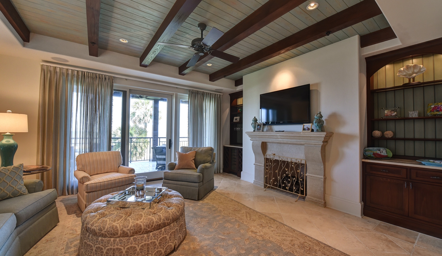 Living room with balcony and fireplace