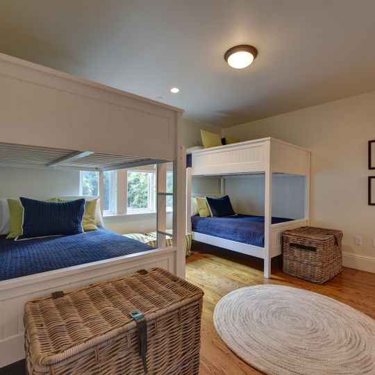 bedroom with two sets of bunk beds