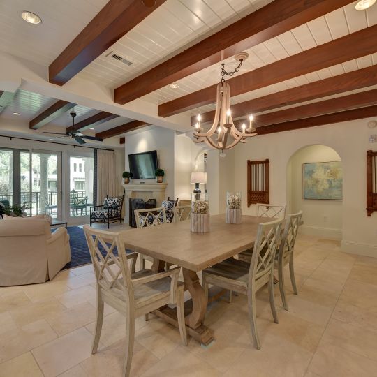 dining room with exposed wood ceilings