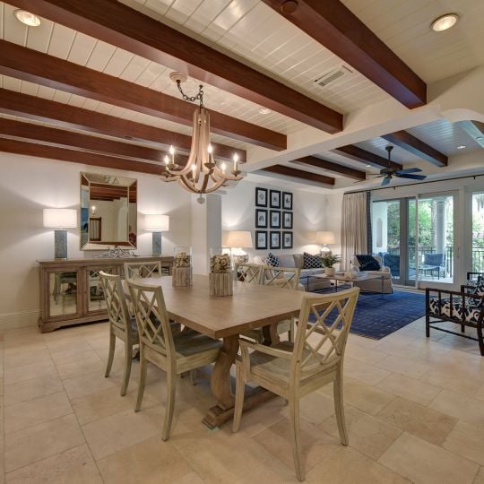 dining room with exposed wood ceilings