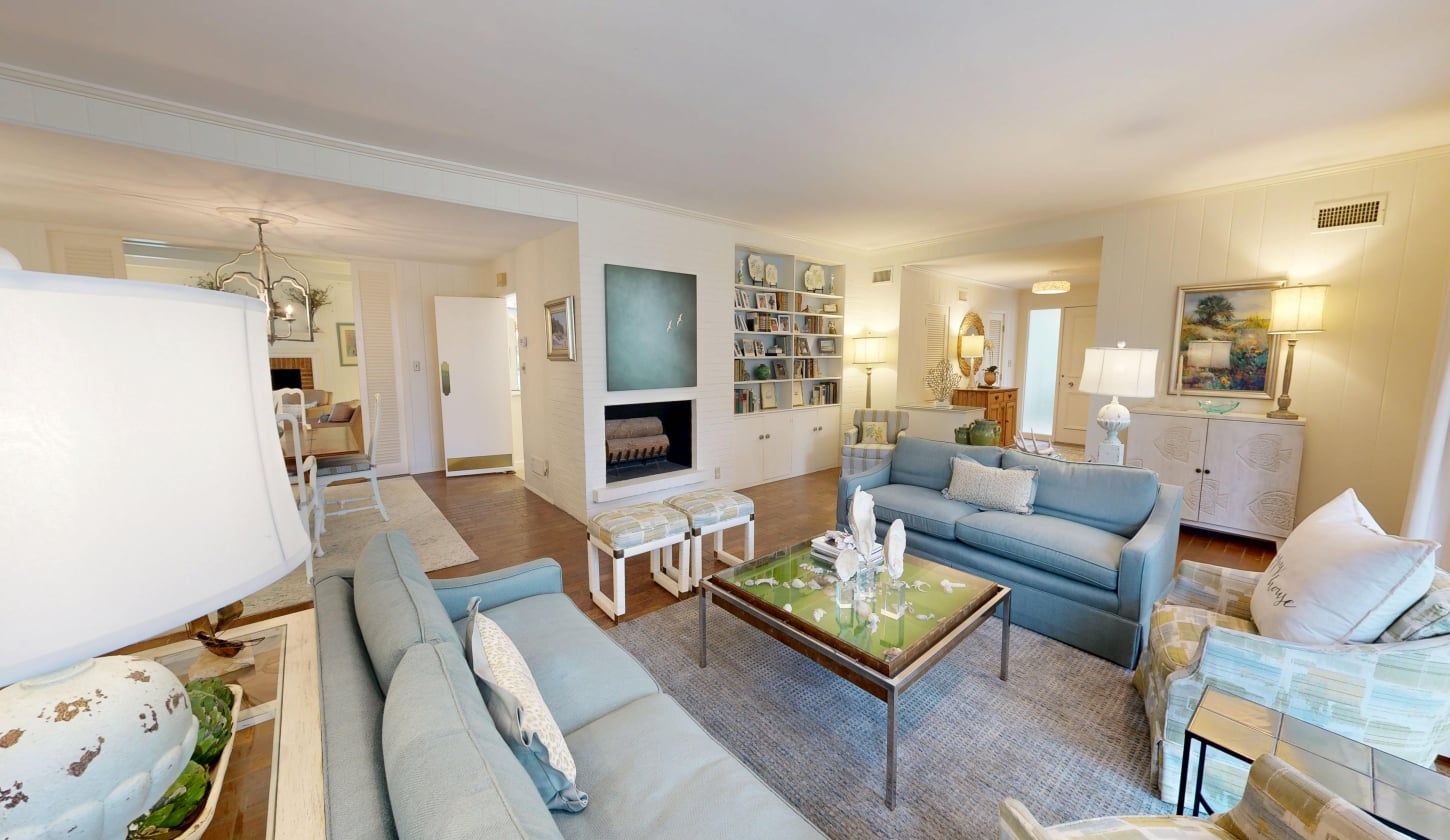 A spacious living room with two couches