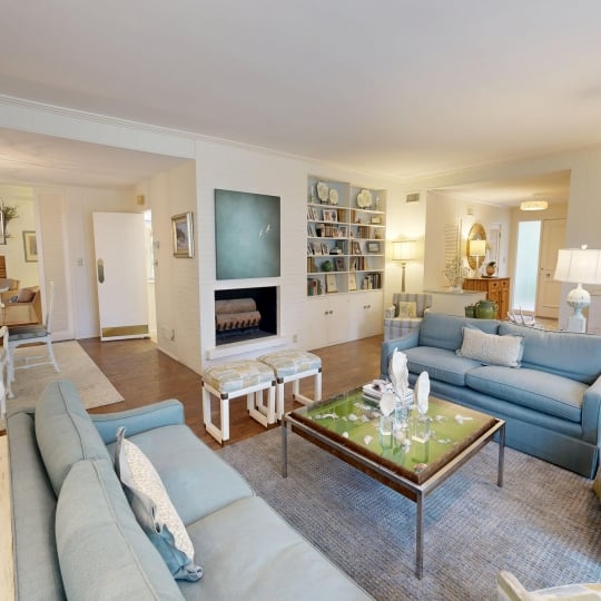 A spacious living room with two couches