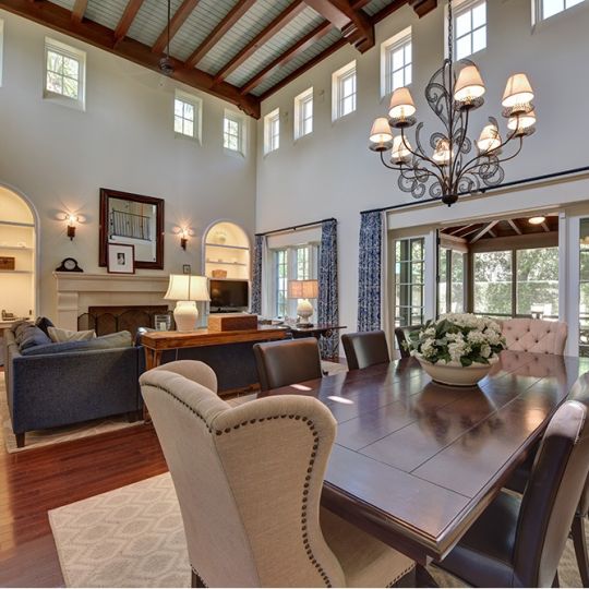 Dining room with high ceiling