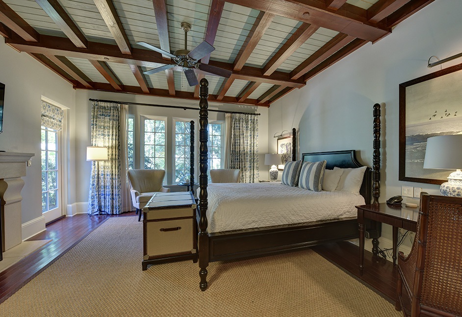 Bedroom with large bed and trunk