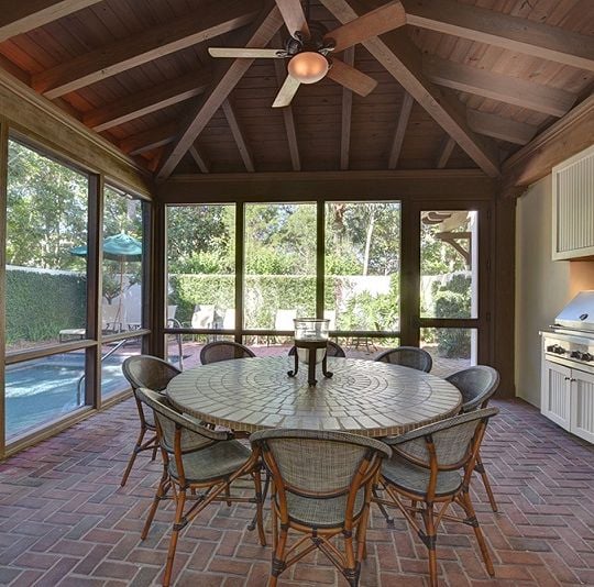Outdoor dining area with built-in barbarcue