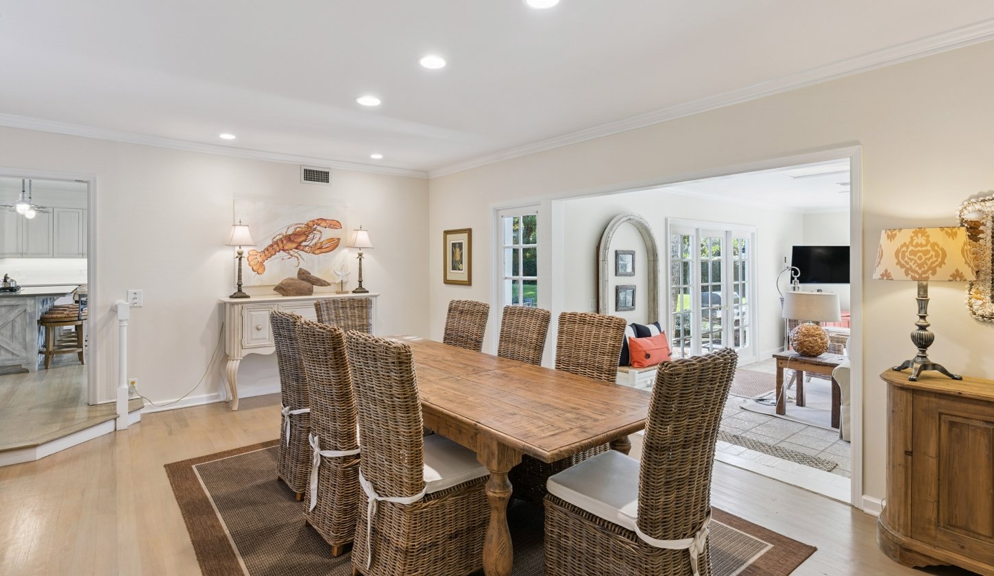 An elegant dining room with a long wooden table