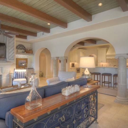Living area with view of kitchen in the background