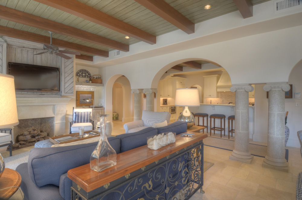 Living area with view of kitchen in the background
