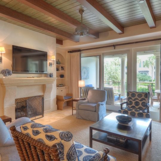 living room with fireplace and built in shelves