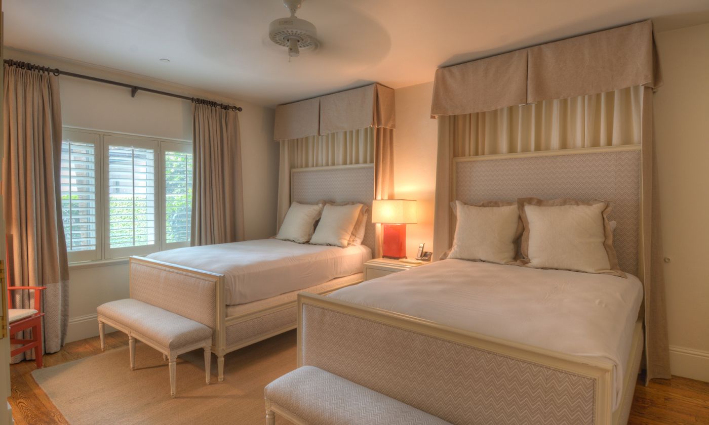 bedroom with two queen beds