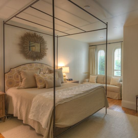 bedroom with a love seat and chair