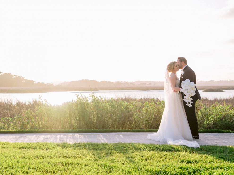 bride and groom kissing