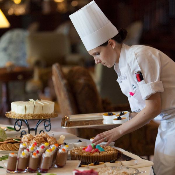 A chef preparing desserts