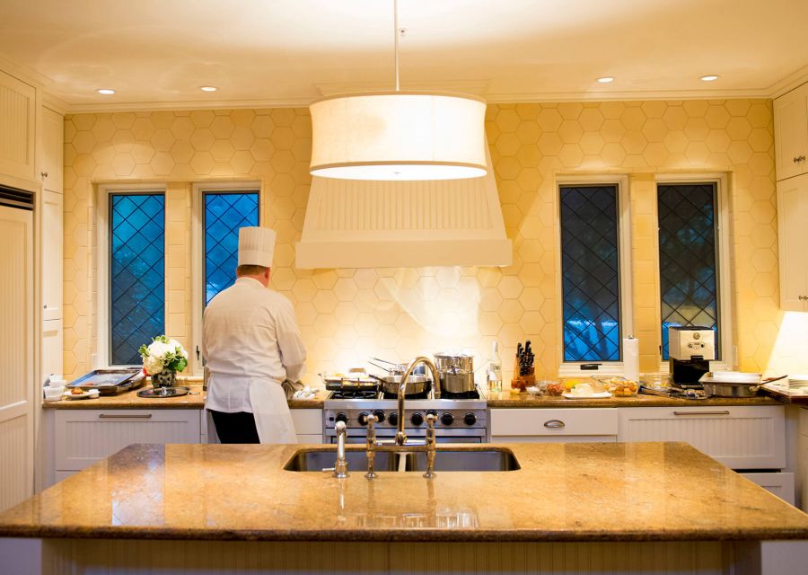 A chef preparing a private dinner at a Sea Island residence