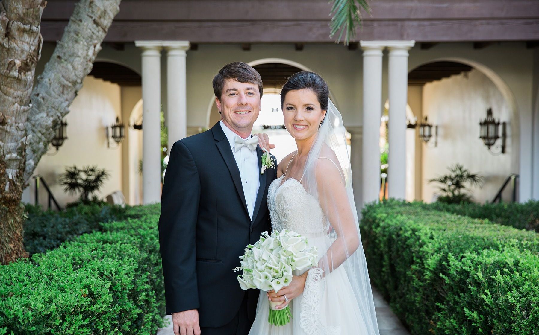 bride and groom posing