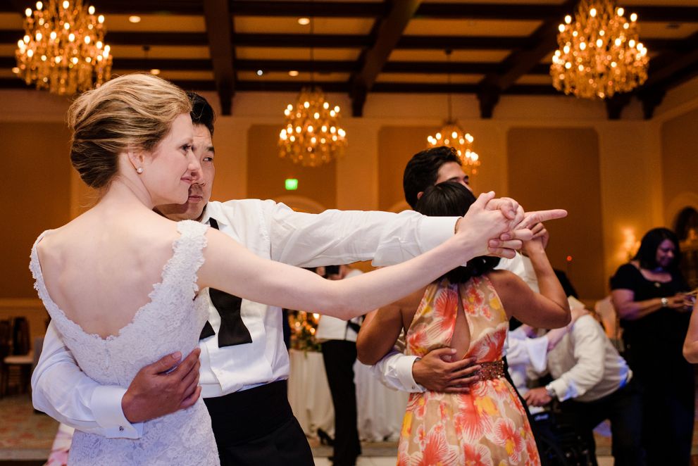 bride and groom dancing