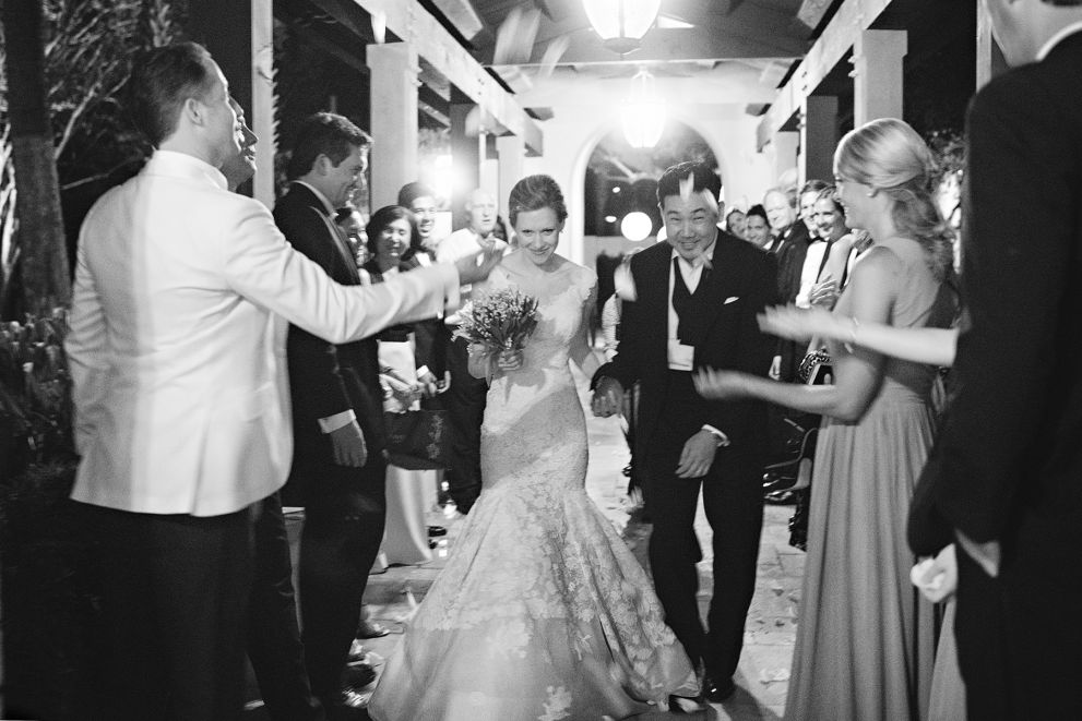 bride and groom leaving the wedding