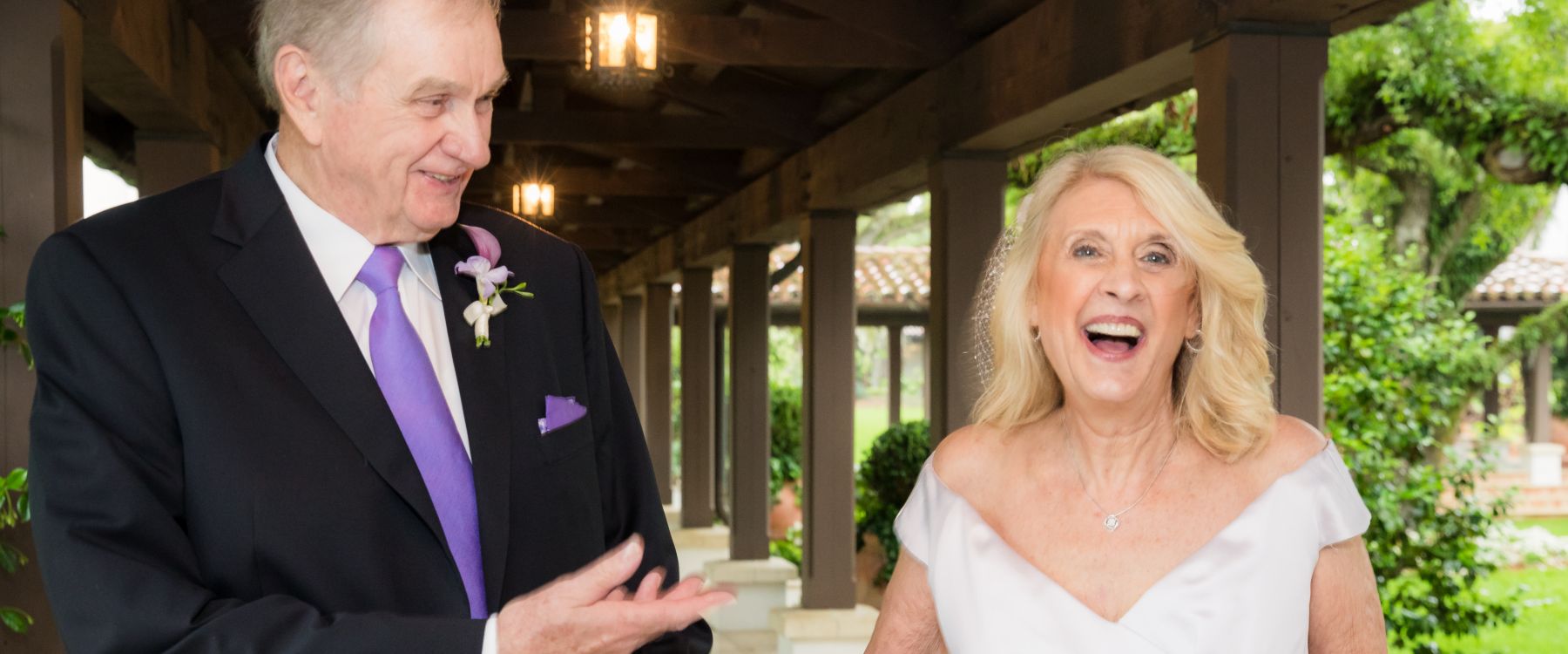 bride and groom laughing