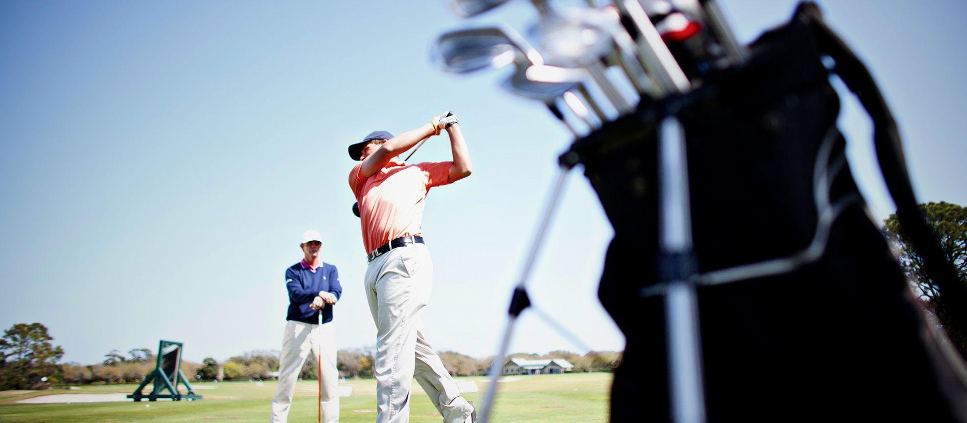Golfer and his golf bag