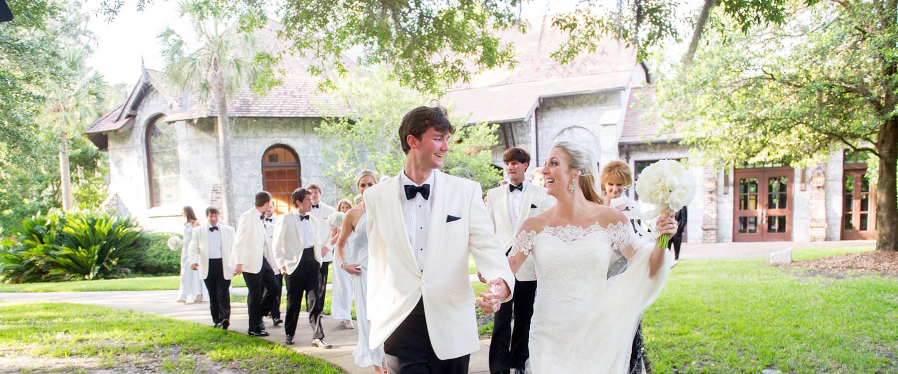 husband and wife walking away from ceremony