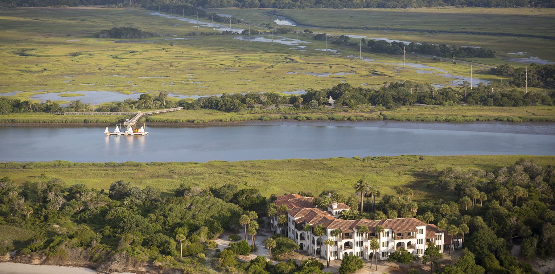 an aerial view of the beach club at sea island