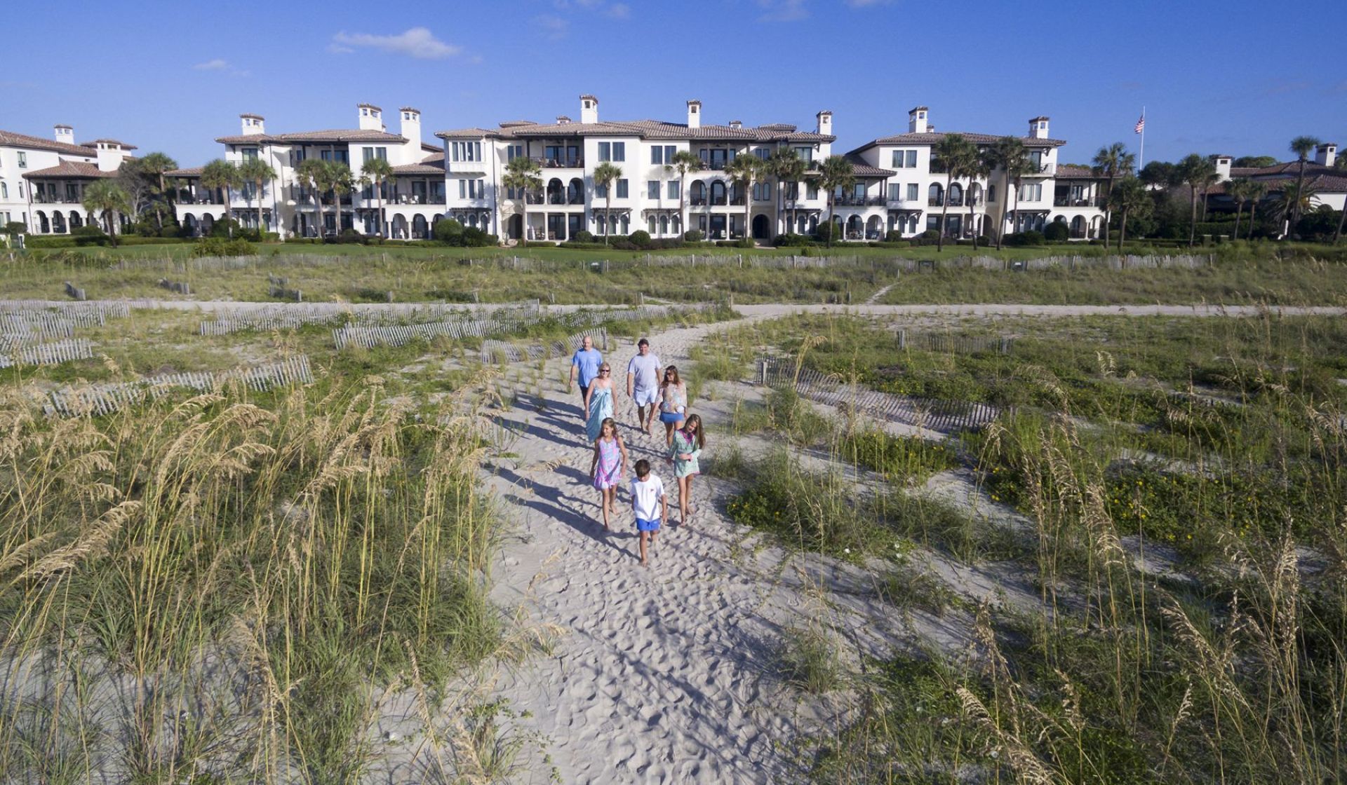 Family on the beach at Sea Island