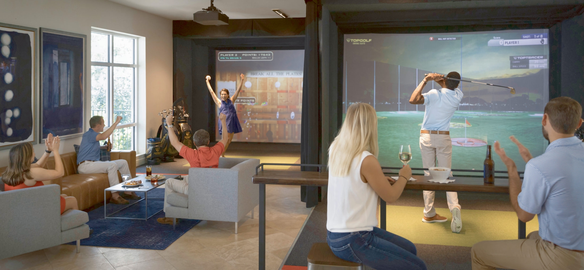 a group of friends enjoying the Topgolf swing suites in the inn at sea island