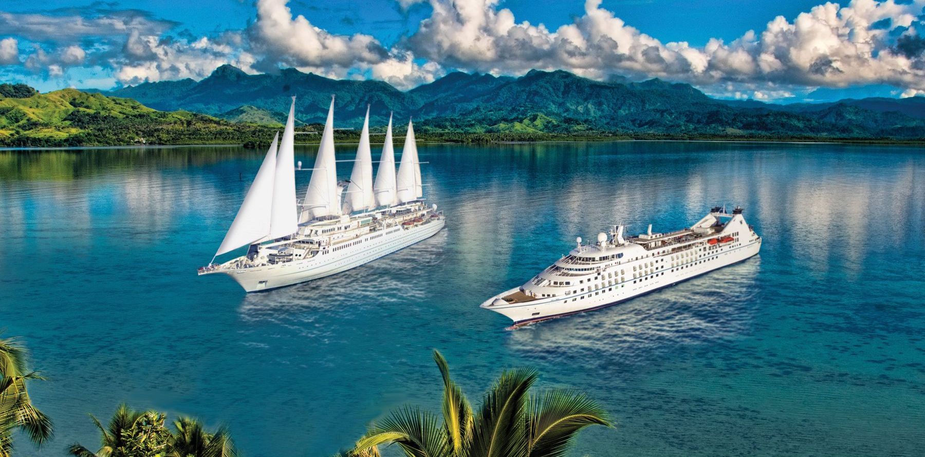 Windstar Cruise Ships sailing on the water
