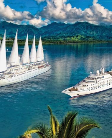 Windstar Cruise Ships sailing on the water