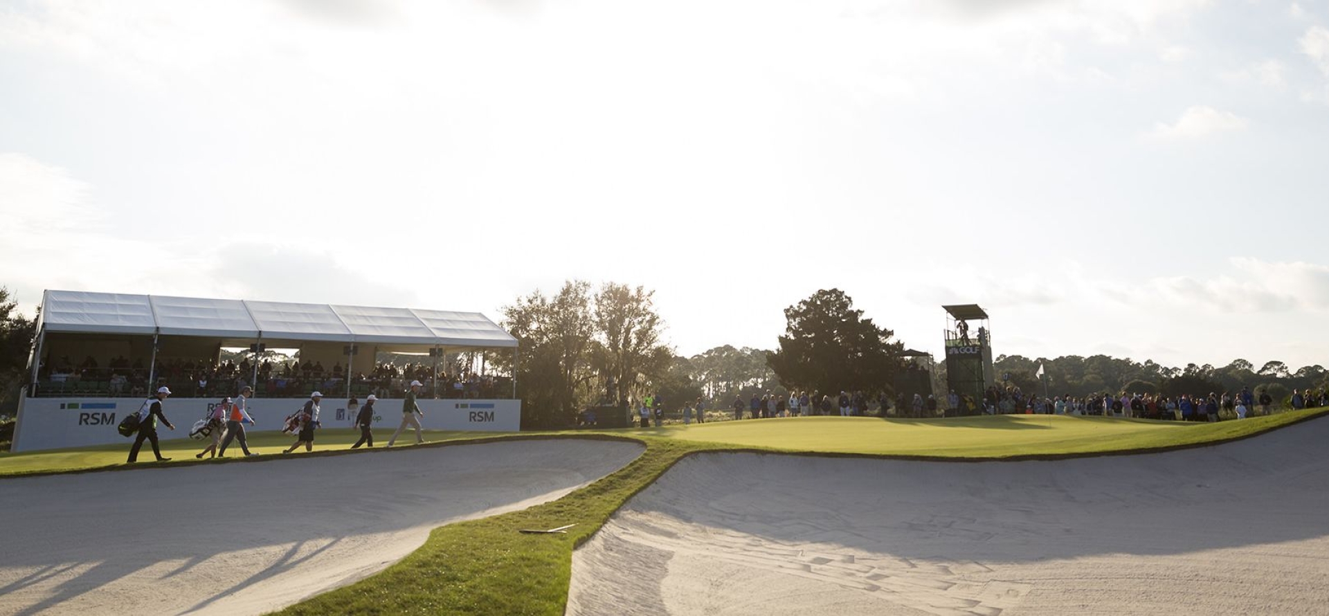 RSM Classic course and players at sundown