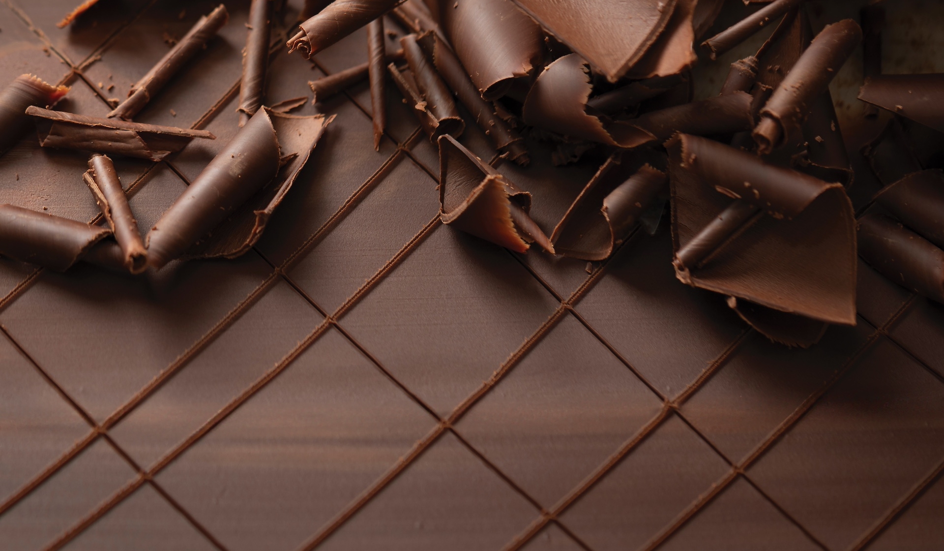 A bar of chocolate covered with shavings