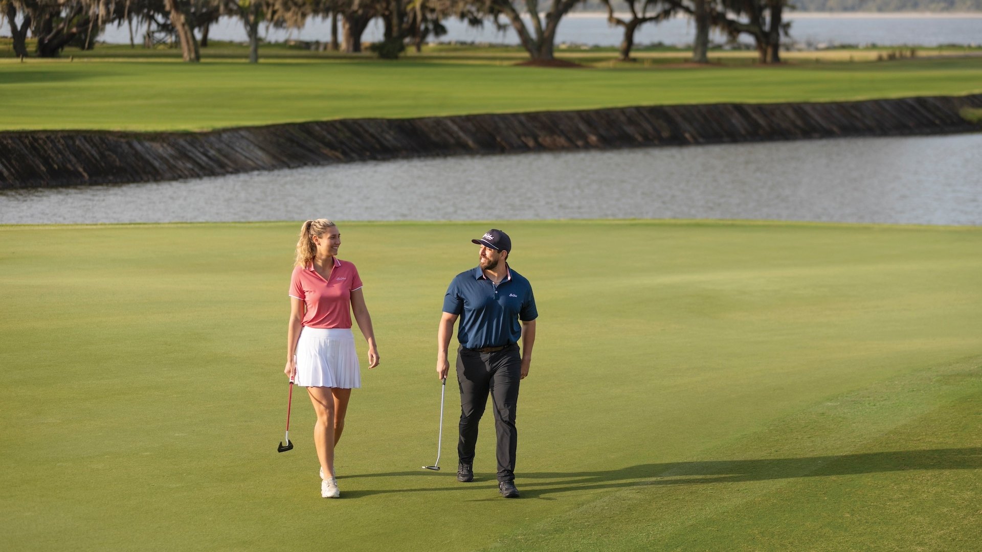 A couple enjoying a round of golf
