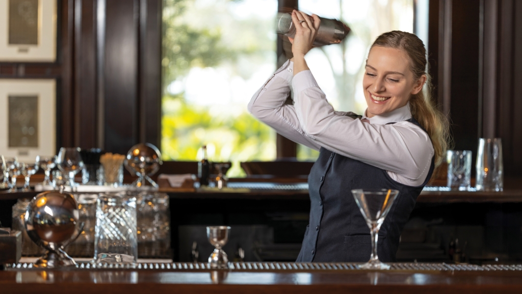 Grace Labruzzo, Lead Bartender at Oak Room, shakes a martini