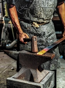 Quintin Middleton beginning the forging process.