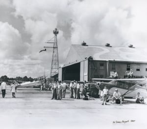 A historic image of a fly-in at McKinnon St. Simons Island Airport in 1947
