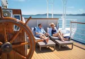 Couple enjoying sun and relaxation on Yacht