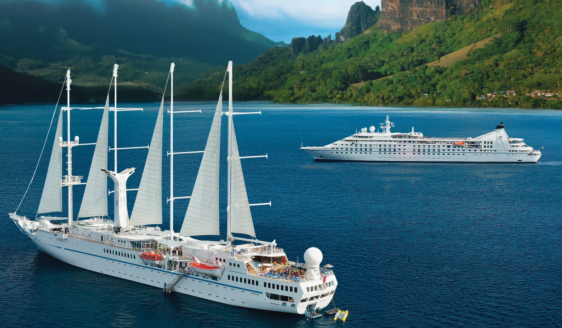 Two large boats (ship and yacht) in French Polynesia