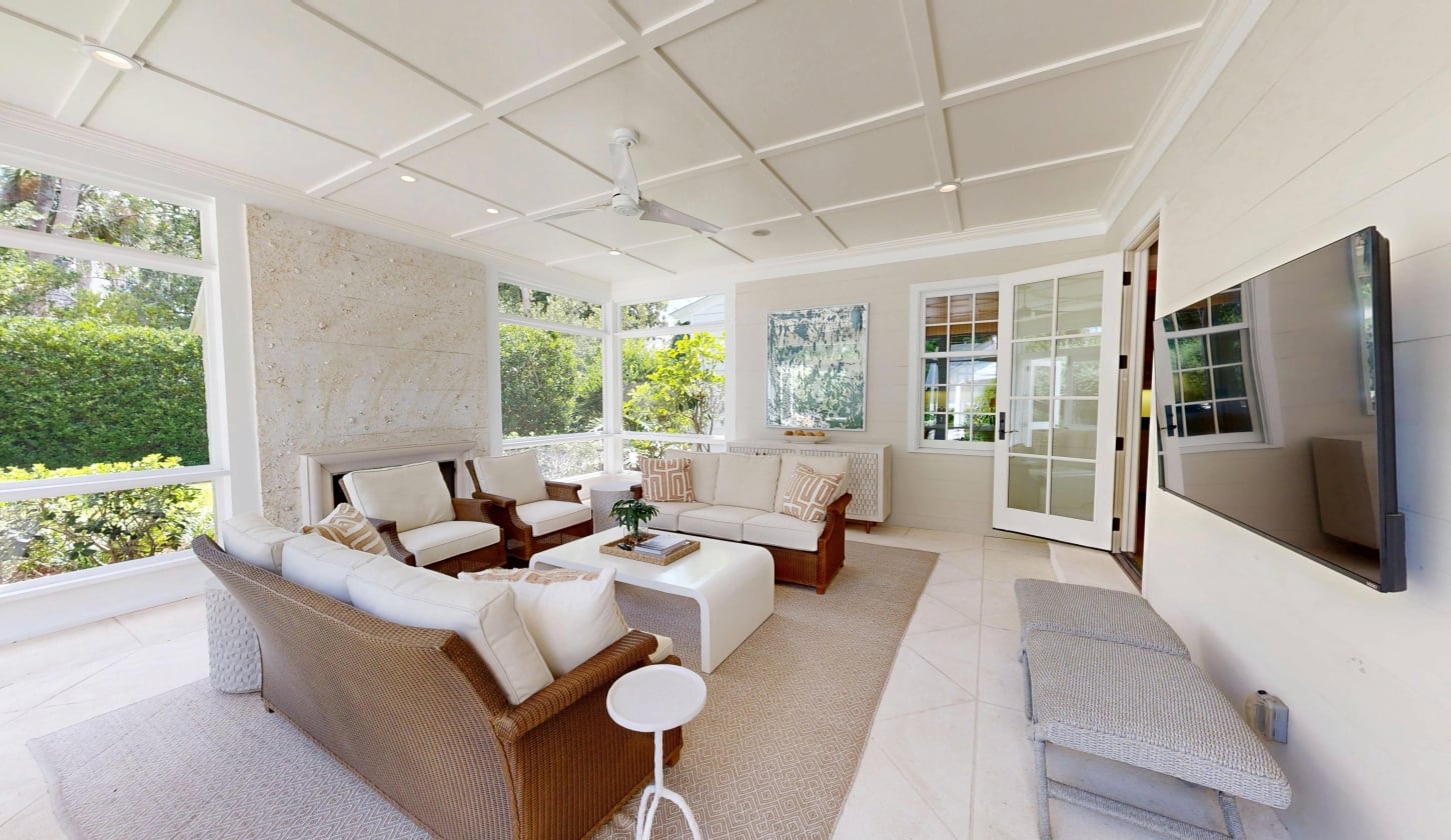 A large family room with natural light and comfortable seating